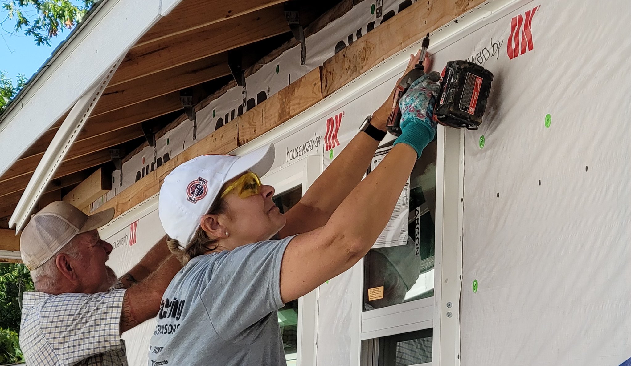 United Way board member Denise Weaver (front) joins OSU Student Affairs and OSU Academic Affairs in completing a project for Habitat for Humanity.
