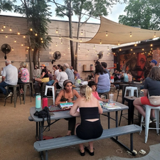 People sitting on the patio at Stonecloud Brewing