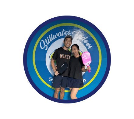 Two pickleballers posing for a photo