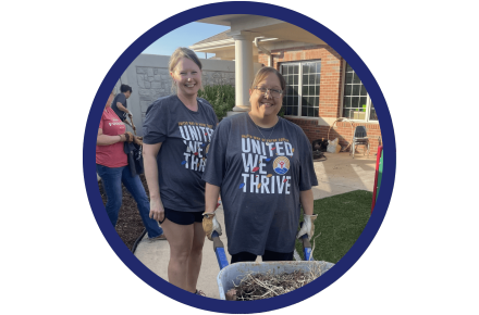 Two women wearing Day of Caring t-shirts