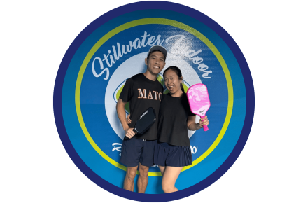 Two pickleballers posing for a photo