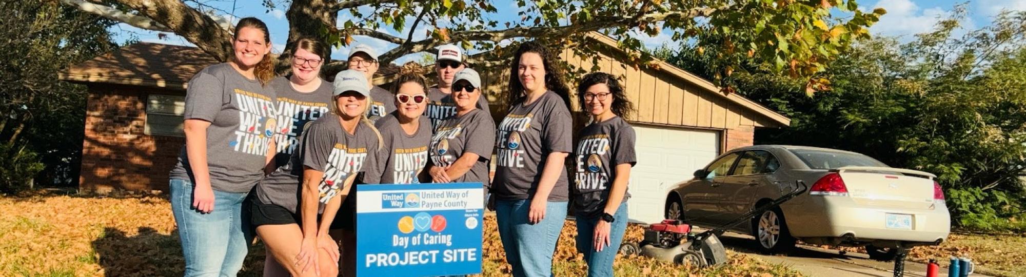 Day of Caring volunteers posing