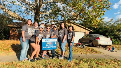Day of Caring volunteers posing
